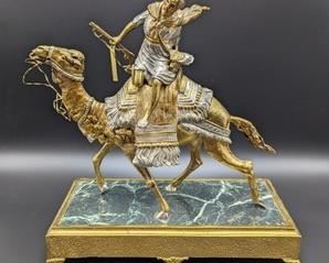 Brass Camel Warrior or Hunter Sculpture with Marble Base. Unique and cool piece is marked from Spain. Measures 12” high and 5” x 11.5” at the base.