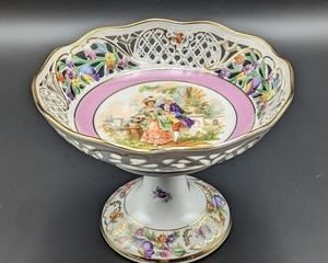 Schumann Bavaria Porcelain Footed Dish. Pretty pink dish is in excellent condition. Measures 5.5” high and 7.5” in diameter.