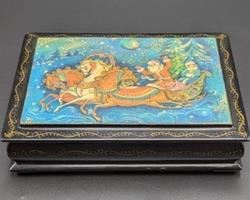 Russian Lacquer Trinket Box. There is some crack/crazing on the top. Measures 6” x 4” and 1.5” high.