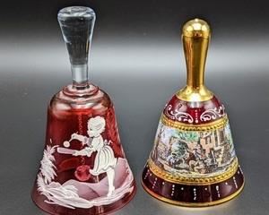 Pair of Vintage Cranberry Glass Bells includes a Cranberry Ruby Red Bohemian Art Glass Mary Gregory Glass Bell Girl with Palette/Brush in Hand  The tallest measures 5.5” high and 3” in diameter at the base.