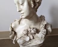 Elegant Female Bust. Appears to be made of resin. Measures 23” high and 12” wide at the shoulders