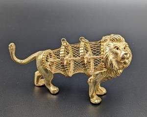 Vintage Hobe Full Relief Gold Tone Lion Pendant. A very cool and unique piece with a caged body! An outstanding example of the quality Hobe workmanship!

Measures 3.5” wide and 2.5” high.