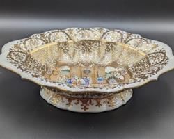 Beautiful Gold Painted Porcelain Chinese Bowl. A elegant piece with intricate details. Measures 11” x 14” and 3.5” high.