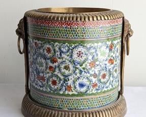 Decorative Vintage Chinese Planter with Lion Figural Handles. A lovely piece that is in great condition! Measures 10” high and 10” in diameter. No manufacture markings. 