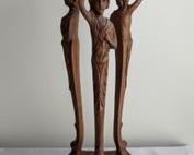 Figural Art Nouveau Carved Wood Stand/Pedestal. There is some wear on the finish/varnish, but in otherwise great shape! Measures 26” high and 9” in diameter.