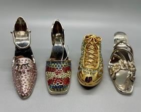 Adorable Swarovski Crystal Adorned Shoes of which the largest measures 2x3 inches