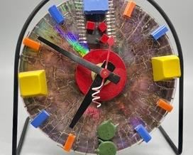 This abstract artist decorative clock measures 5.5 inches tall. Please see the photos for the artist