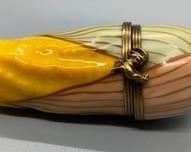 This Limoges of France corn cob trinket box measures 4 inches long.