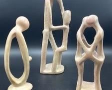 The largest of these stunning soapstone figurines measures 13 inches tal