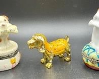 These largest of these delightful dog trinket boxes measures 3.5 inches.