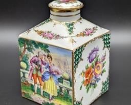 Painted Porcelain Tea Canister. Appears to be Limoges and is in great condition. Measures 3” x 3” and 4.5” high.