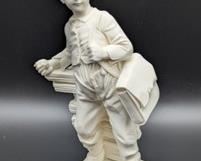A. Giannelli Young Boy Figurine. Measures 9” high and 3” wide at the base.