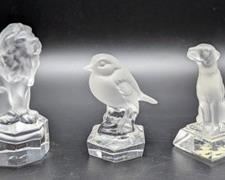Gobel Crystal Animal Figurines. Includes a dog, bird and lion. The largest measures 4.5” high and 2” in diameter at the base.