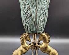 Vintage Brass Horse Vase. Two of the horses have wear/oxidization on the finish that can be seen in the photos. Measures 13” high and 7” in diameter at the top
