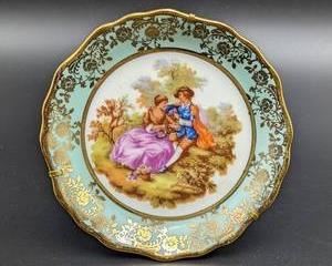 Limoges Miniature Porcelain Plate. Measures 4” in diameter.
