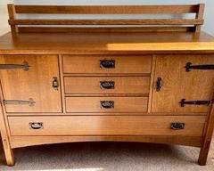 Wonderful arts and crafts style console cabinet measures 59x20x43 inches and has classic metal detailing