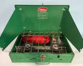 Coleman 2 Burner Gas Camp Stove in used condition with minor surface rust.