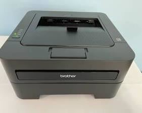 Brother HL-2270DW Printer in used condition, powering on and believed to be working well.