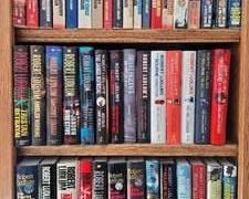 Robert Ludlum Book Selection includes 27 hardcover books with jackets, 2 large softcover books & 17 standard-sized softcover books.