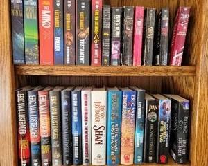 Book collection authored by Eric Van Lustbader/Eric Lustbader includes 14 hardcover books with jackets and 22 softcover books, most in great condition. Some softcover books show some wear.
