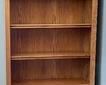 This beautiful bookshelf has adjustable shelves and measures 34x91x13 inches