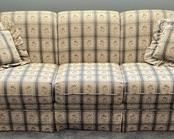 This Elizabeth Hall Premier Collection country themed sofa has wonderful wooden accents and measures 84x34x30 inches