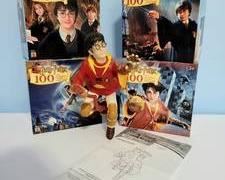This lot includes 4 100-piece Harry Potter puzzles - Ages 5+ - 11 1/2" x 15" finished size

PLUS: Snitch Chasing Harry battery-operated toy with original instructions

All puzzle pieces appear to be included, but have not been counted