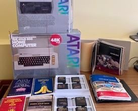 Large Vintage Atari Game System.  What a fun nostalgic set! 

The Atari 810 Disk Drive 
The Atari 800 Home Computer 
Variety of instruction booklet 
Game cartridges; Pac Man, Centipede, Space Invaders, Missile Command, Star Raiders and more 
Game manuals 
Items not tested