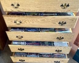 This lot includes 6 drawers FULL of DVD's! Includes MANY different titles for your viewing pleasure! You will have hours and hours of movies with this fantastic lot !