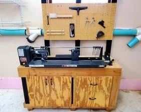 Craftsman Copy Crafter Wood Lathe mounted on a professionally Built Wooden Cabinet