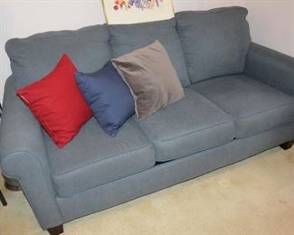 STYLISH HIDE A BED SOFA.