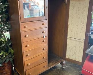 Made in Chattanooga, TN, by ACME KITCHEN FURNITURE CO., Antique Wardrobe with original hardware, mirrored top door, and inside pull-out-rack