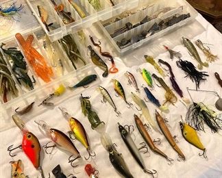 Lots of fishing lures and equipment 