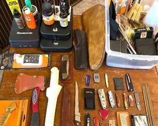 Knives, gun storage and cleaning equipment. 
