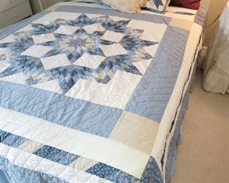 Full bed with white headboard