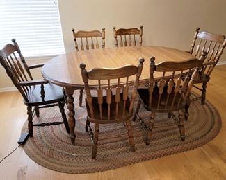 Kitchen table and 6 chairs. Braided area rug