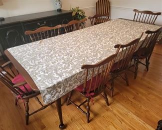 Dining room table and eight chairs (110.5" with leafs - 74.5" without)