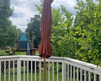 Patio umbrella with stand