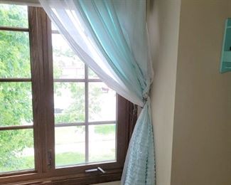 Pair of light aqua curtains