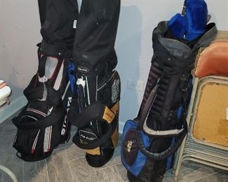 Golf bags and clubs
