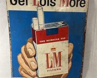 Get Lots More in the "red headed" pack or box. L&M Filters Ligget & Myers Tobacco Co. Metal Advertising Sign