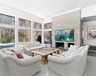 Three Restoration Hardware Sofas and one large coffee table