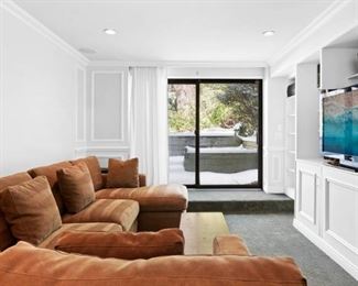 Crate and Barrel Sleeper Sectional actual color is more of a taupey brown not rust