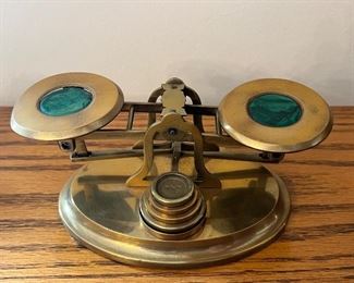 Item 25:  English c. 1870 Morley of Norwich brass postal scale set with malachite panels and a complete set of matching brass weights.  The postal rates are inscribed on the pan containing the weights which is rather unusual - 6.75" x 2.5": $1400