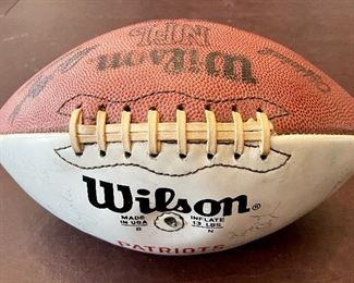 Item 203:  1970s Patriot Signed Football with NFL Hall of Fame Signatures John Hannah and Mike Haynes: $245