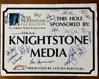 Item 194:  "Sean McDonough Celebrity Golf Challenge" Corrugated Sign with many signatures including John Havilcek, Bob Cousey, Joe Morgan, Andre Tippett, Ray Bourque, Dennis Eckersley, Tom Coughlin, Steve Grogan among others: $250