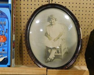 Antique oval picture in frame