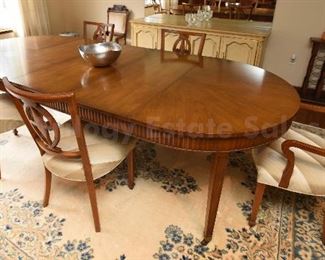 Baker dining table with six chairs