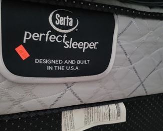 There are two new twin perfect Serta sleeper beds