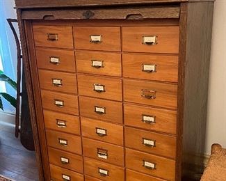 Antique file cabinet with Tambour door that pulls down